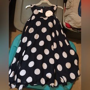 Girls size 6. Navy blue polka dot dress! Excellent condition!